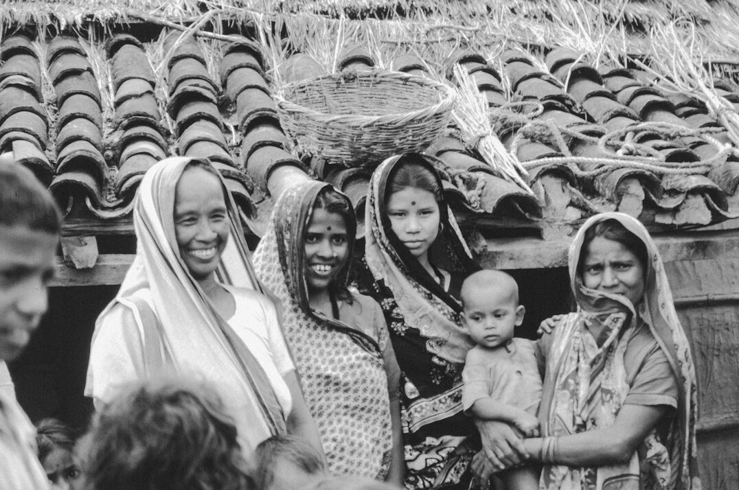 documentary photographer with locals