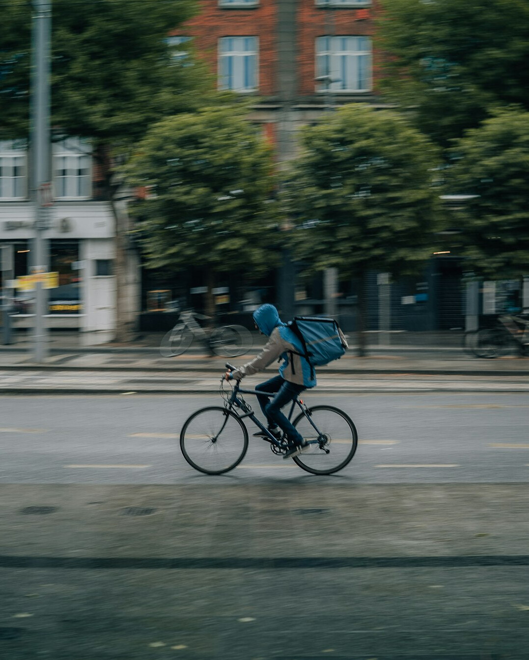 cyclist delivering packages